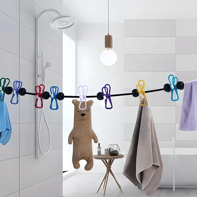 Пренослива жица за облека со штипки